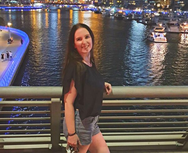 Living in Dubai as a woman: standing on a bridge crossing Dubai Marina