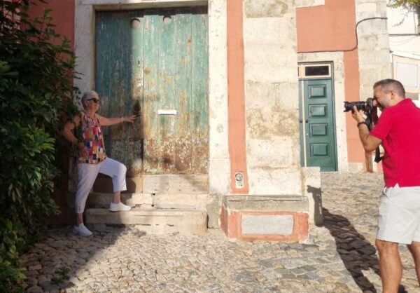 Photographer taking a shot of mum during our photoshoot in Lisbon